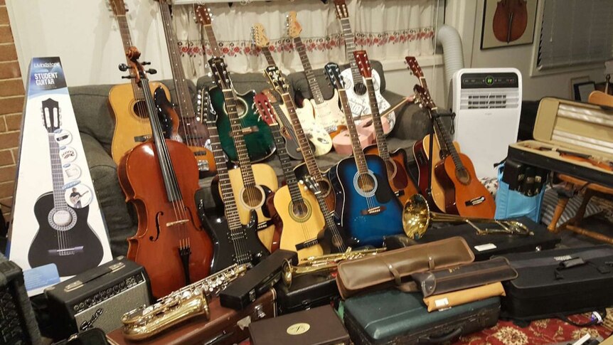 Donated musical instruments in lounge room