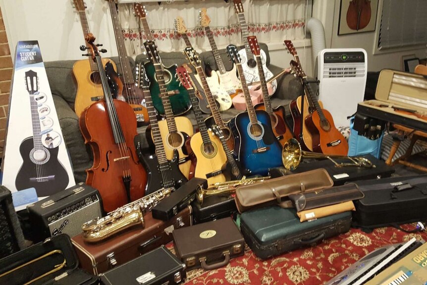 Donated musical instruments in lounge room