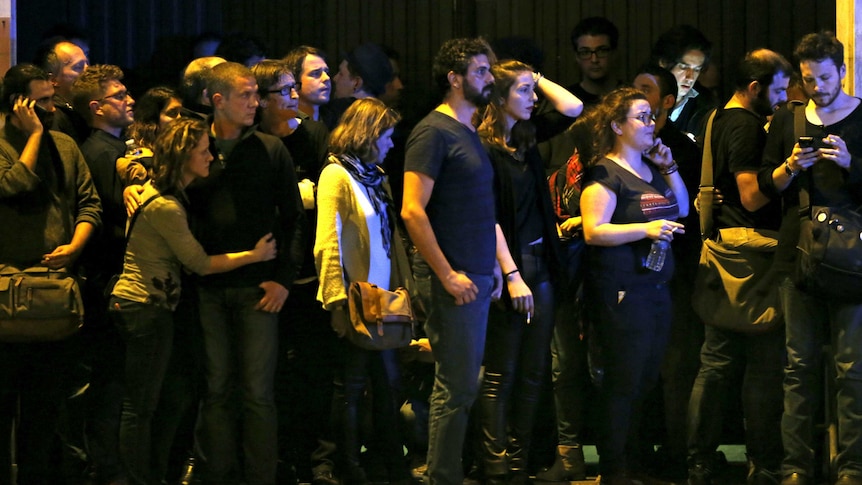 People gather near the Bataclan concert hall