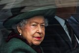 The Queen, wearing green, sits alongside Prince Andrew inside a royal Bentley.