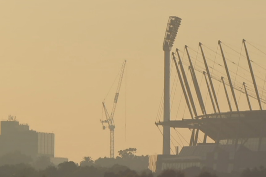 A smokey haze envelopes the MCG in Melbourne.