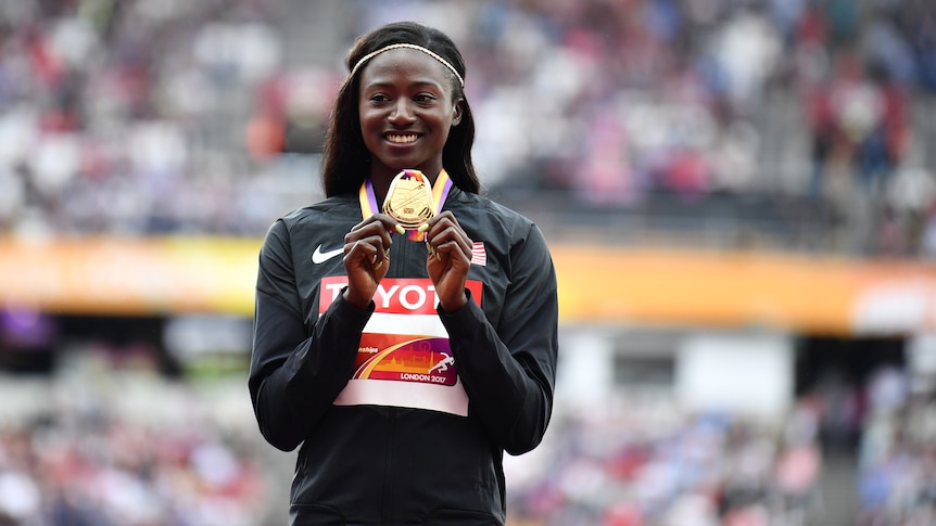 Gold medalist Tori Bowie of the United States poses with her medal.