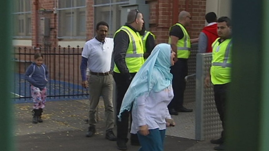 Parent protests outside the Islamic College