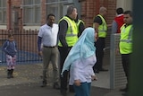 Parent protests outside the Islamic College