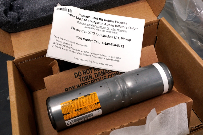 A canister containing an airbag.