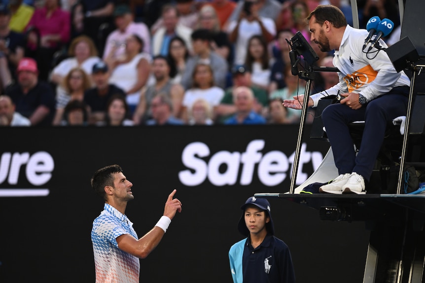 Novak Djokovic argues with a chair umpire at the Australian Open.