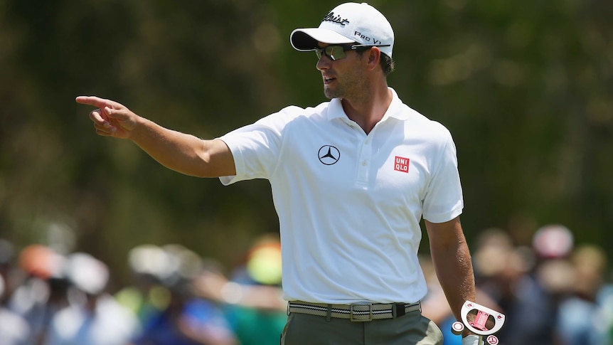 Adam Scott acknowledges the crowd on his way to capturing the Australian PGA title at Royal Pines.