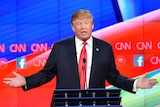 Donald Trump gestures during the fifth Republican presidential debate