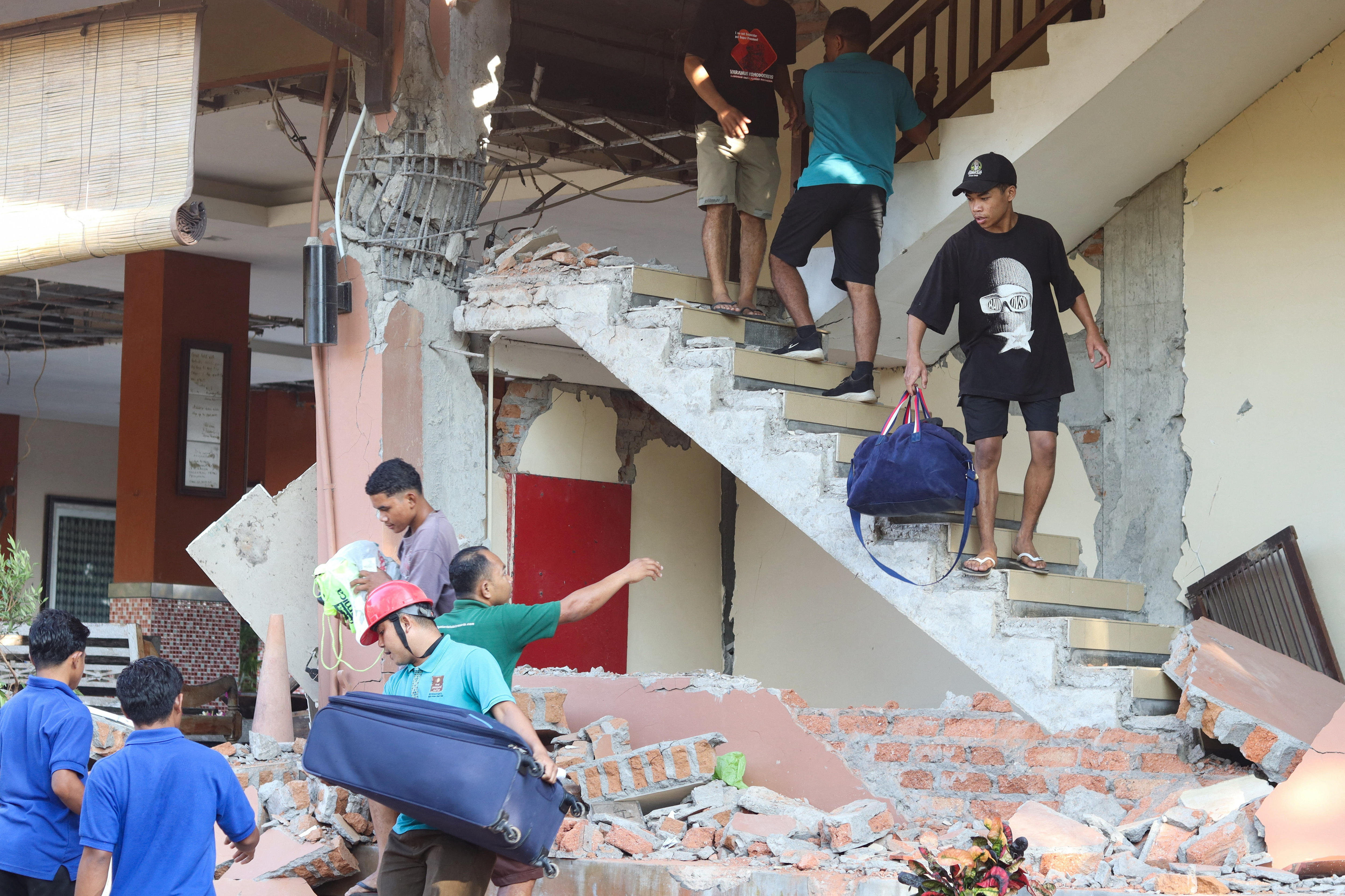 Earthquake survivors 'still on alert' after dozens killed in Indonesia