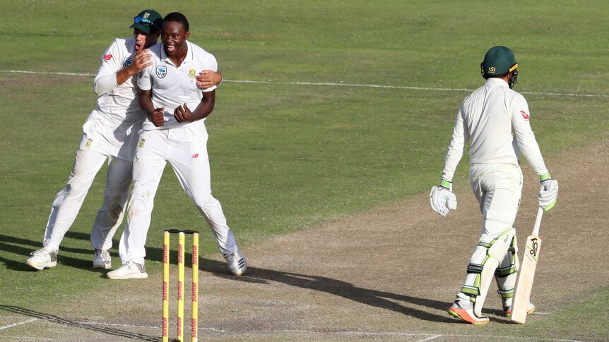 Kasigo Rabada celebrates after taking the wicket of Australia's Usman Khawaja