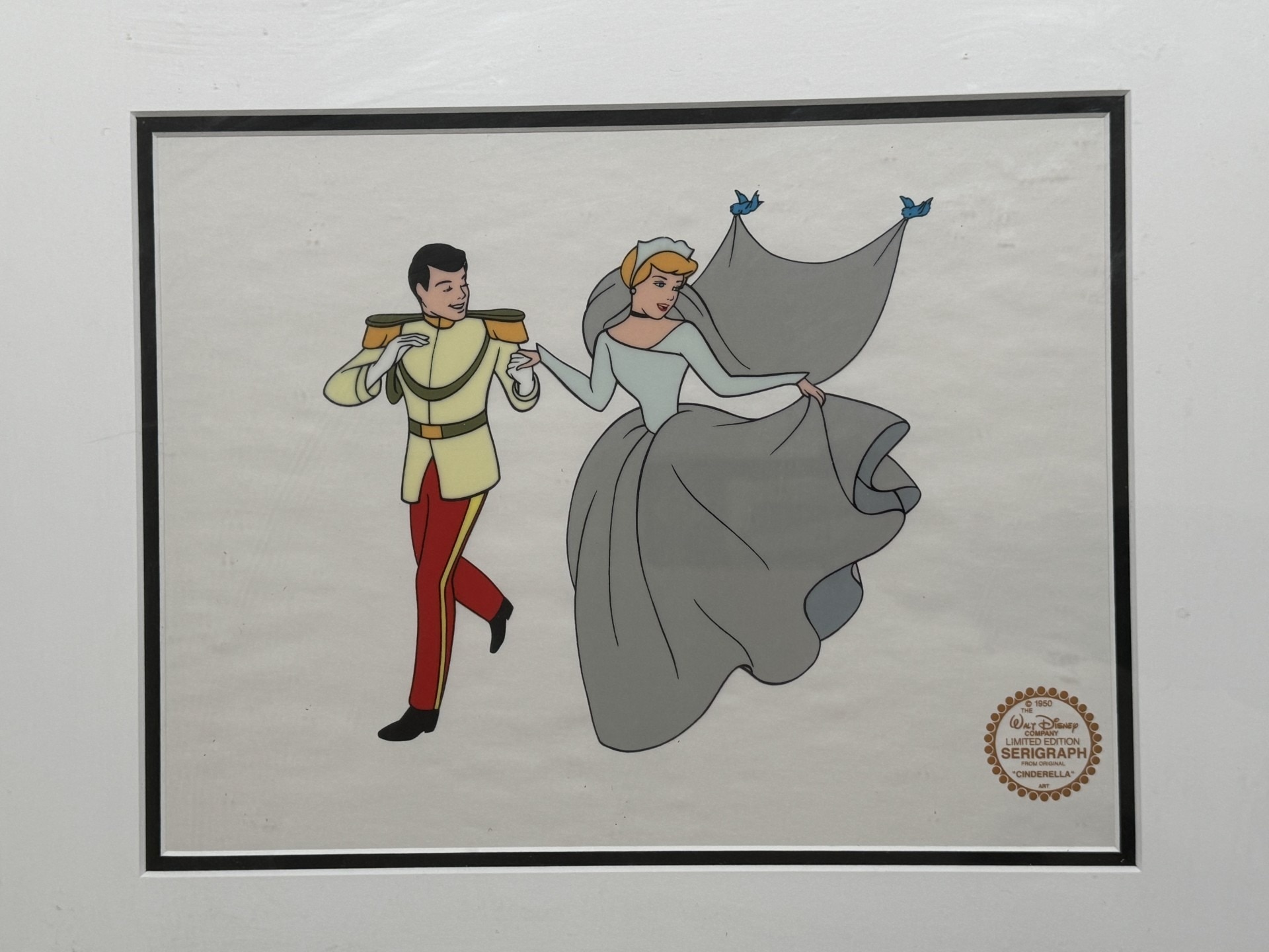 A framed serigraph cell from Cinderella.