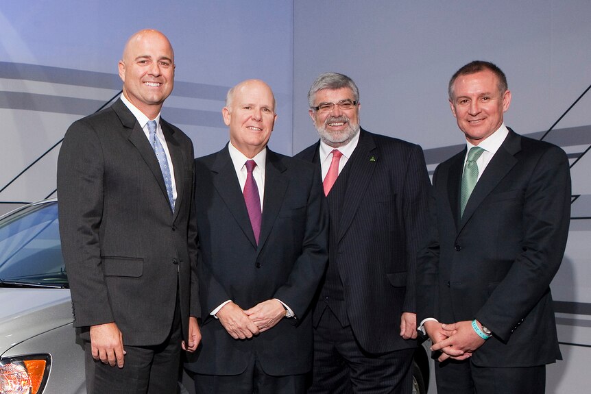Messrs Devereux, Akerson, Carr and Weatherill at GM's HQ in Detroit