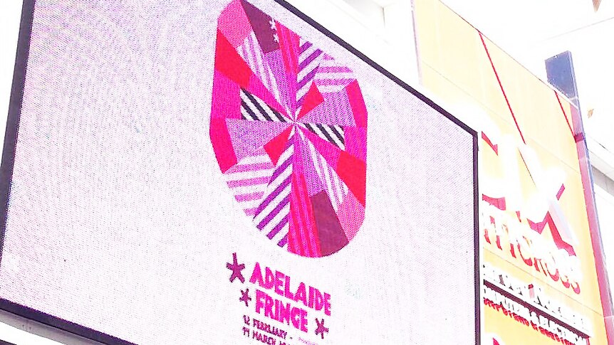 Adelaide Fringe poster chosen for 2016 event is displayed on a big screen in the city