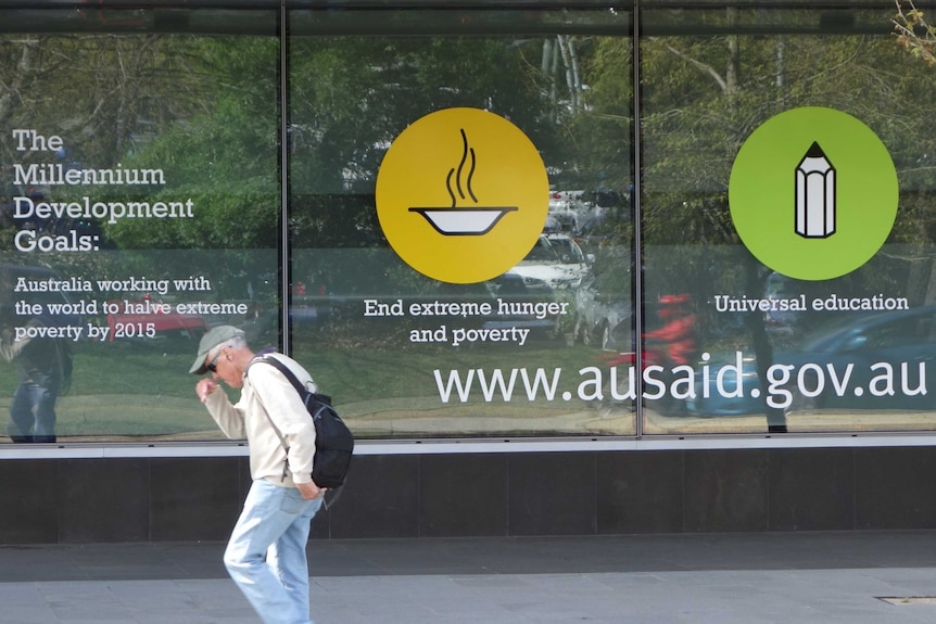More than 1,000 Canberra based staff from AusAID will be merged into the Department of Foreign Affairs and Trade.