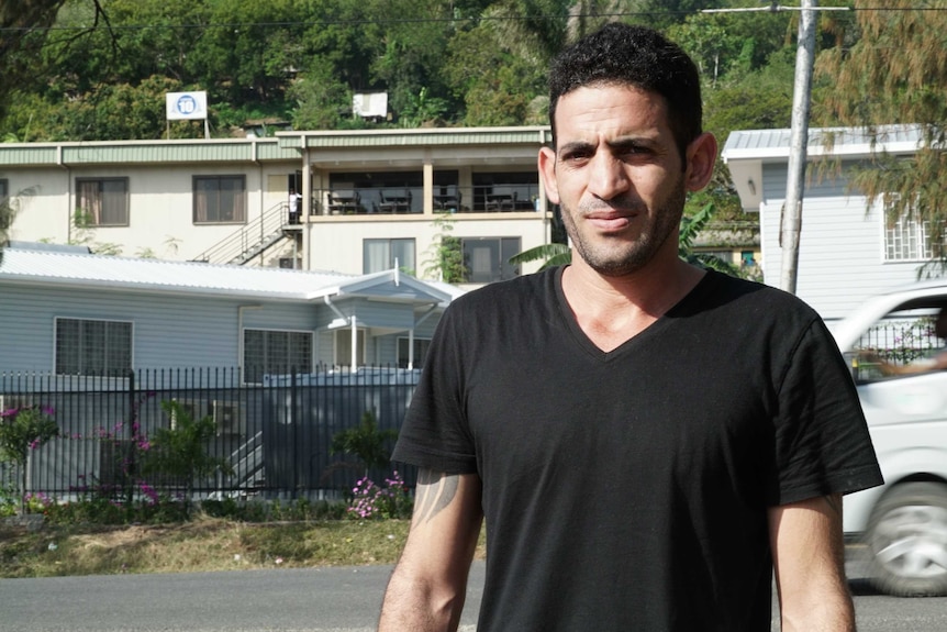 Kurdish refugee Diako Azizi outside the hotel he's staying at in Port Moresby.