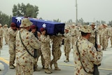 Private Jacob (Jake) Bruce Kovco's casket is loaded onto a C-130 Hercules in Baghdad