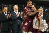 The Maroons' Petero Civoneciva and Cameron Smith embrace while holding the Origin Shield.