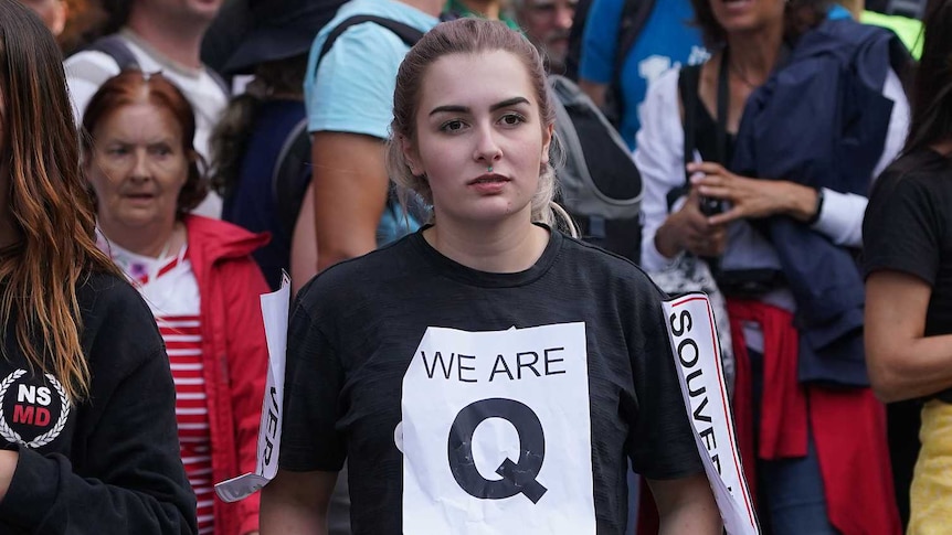 A right-wing protest with QAnon followers