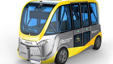 A studio image of a yellow and grey driverless electric shuttle bus.