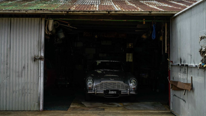 James Bond Aston Martin DB5 in a old garage