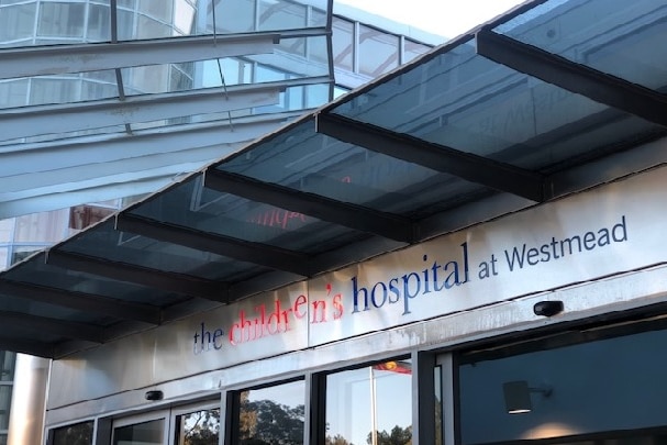 A sign on a building that reads: The Children's Hospital at Westmead