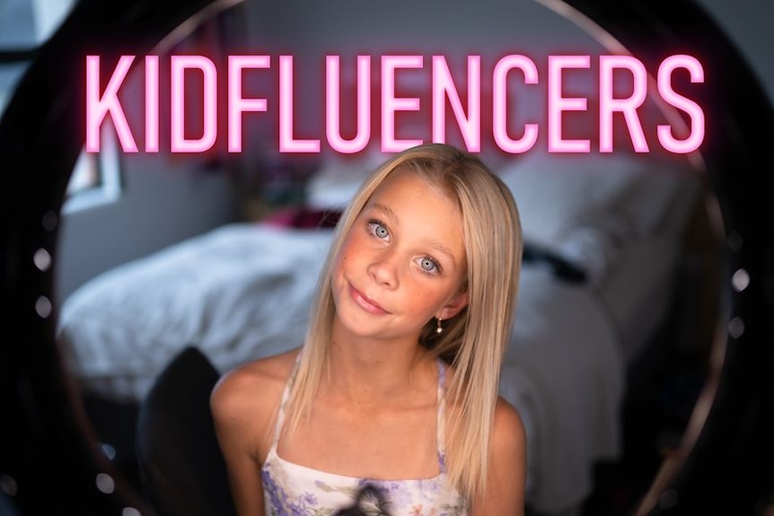 A young girl with blonde hair looks into a mirror. The word 'kidfluencers' is in neon pink above her.