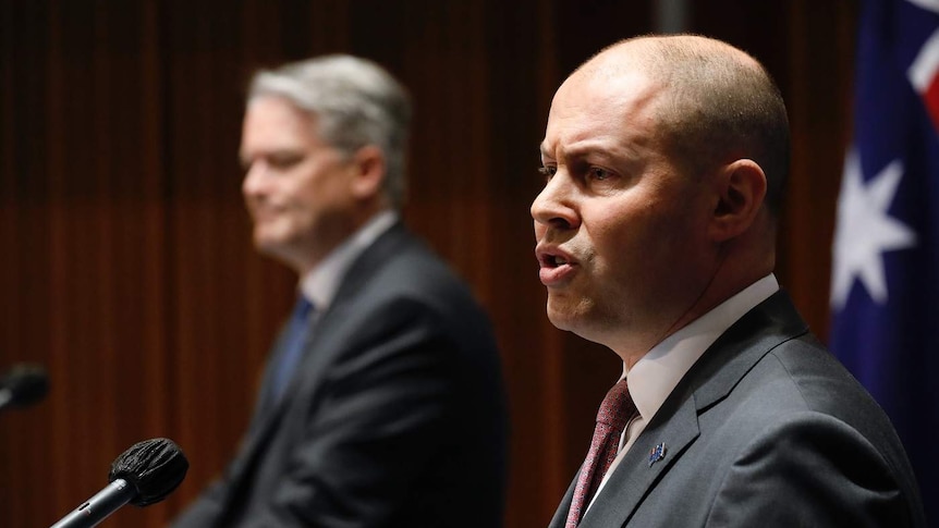 Josh Frydenberg and Mathias Cormann speak to the media.