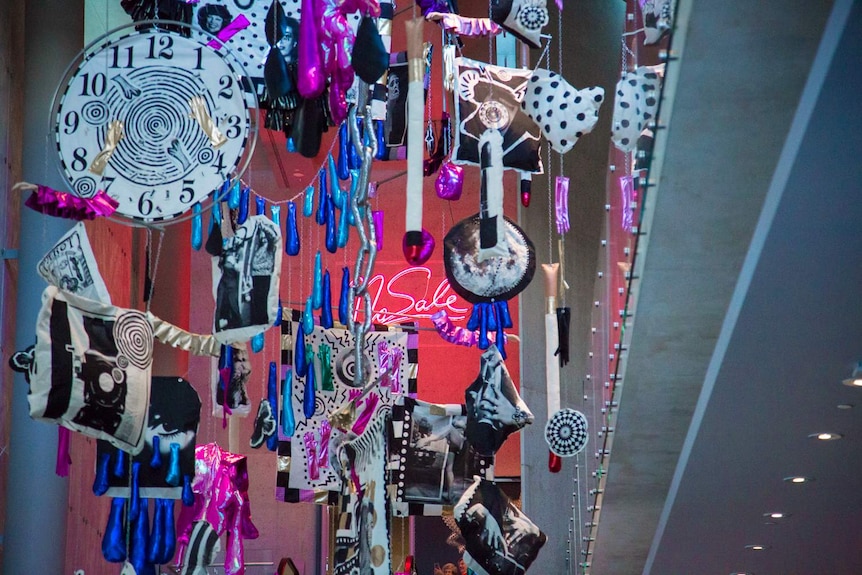 A colourful, neon art installation hangs in the foyer of the National Gallery of Australia