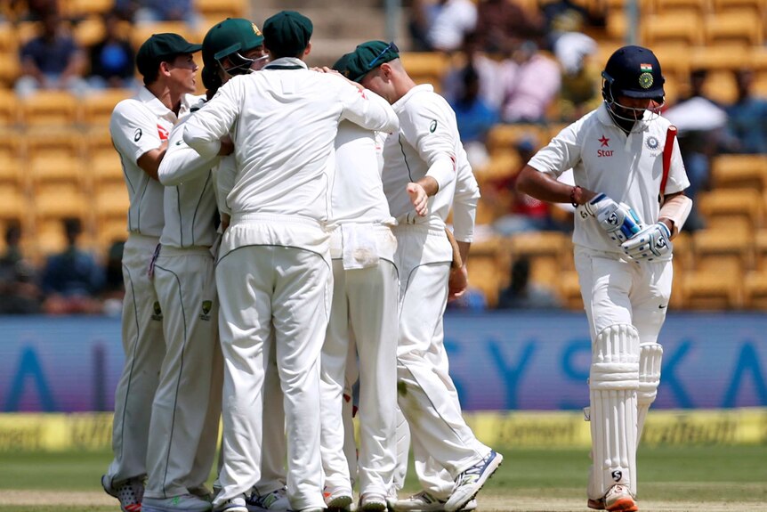 Aussies celebrate Pujara dismissal
