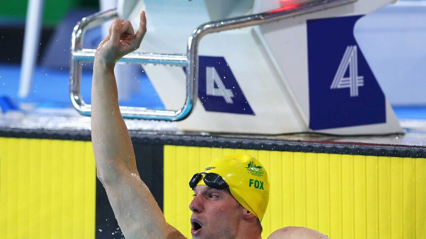 Australia's Daniel Fox celebrates gold in the men's parasport S14 200m freestyle final.