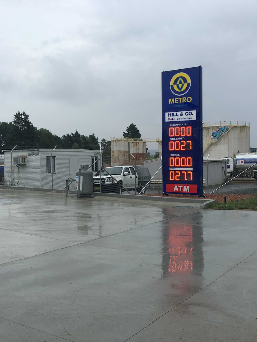 The petrol station's board, advertising unleaded E10 petrol and diesel for 0 cents per litre.