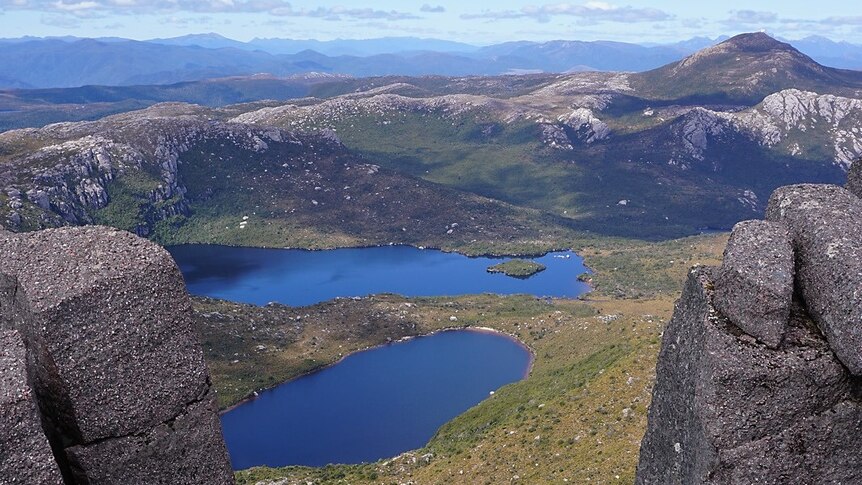 A view over wilderness lakes from the top of a mountain