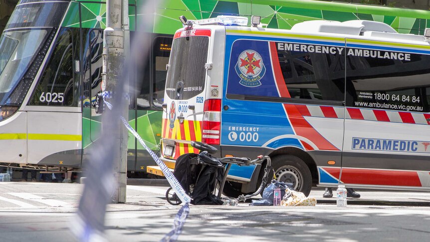 A pram is tipped over at the scene of the Bourke Street attack.