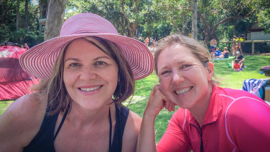 Seana Smith and Benison O'Reilly smiling into the camera with park in background