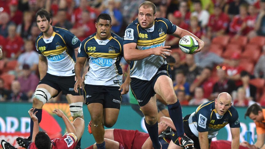 Brumbies prop Ben Alexander with the ball against the Reds at Lang Park on March 14, 2015.
