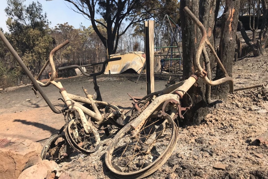 Burnt bike and swing set.