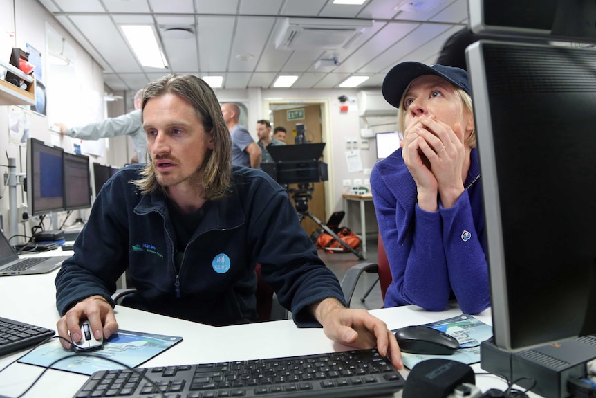 Scientists Matt Boyd and Emily Jateff on the RV Investigator