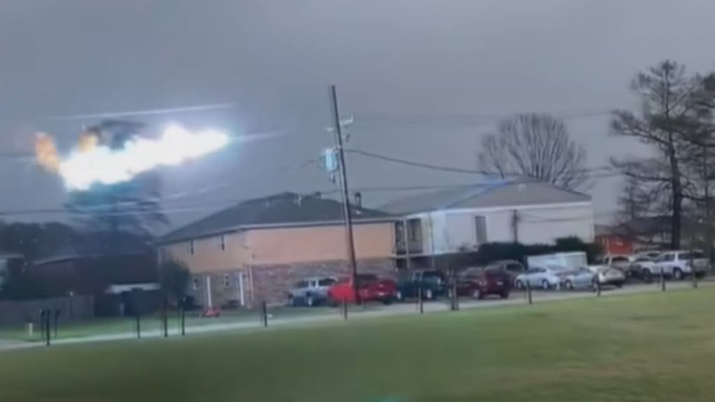A large bolt of electricity surges across a powerline in Louisiana ...