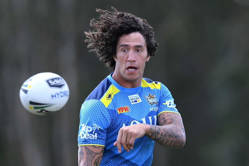 Kevin Proctor passes the ball during the Gold Coast Titans training session on April 19, 2017.