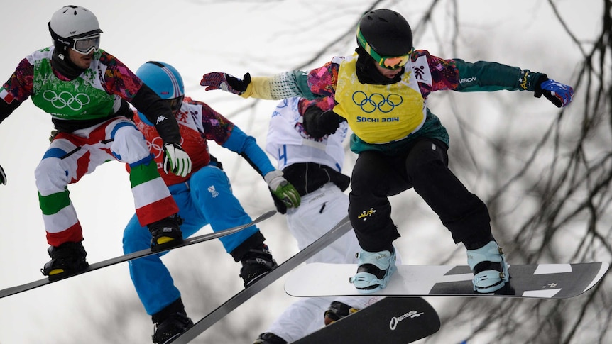 Cam Bolton leading his quarter-final in the snowboard cross