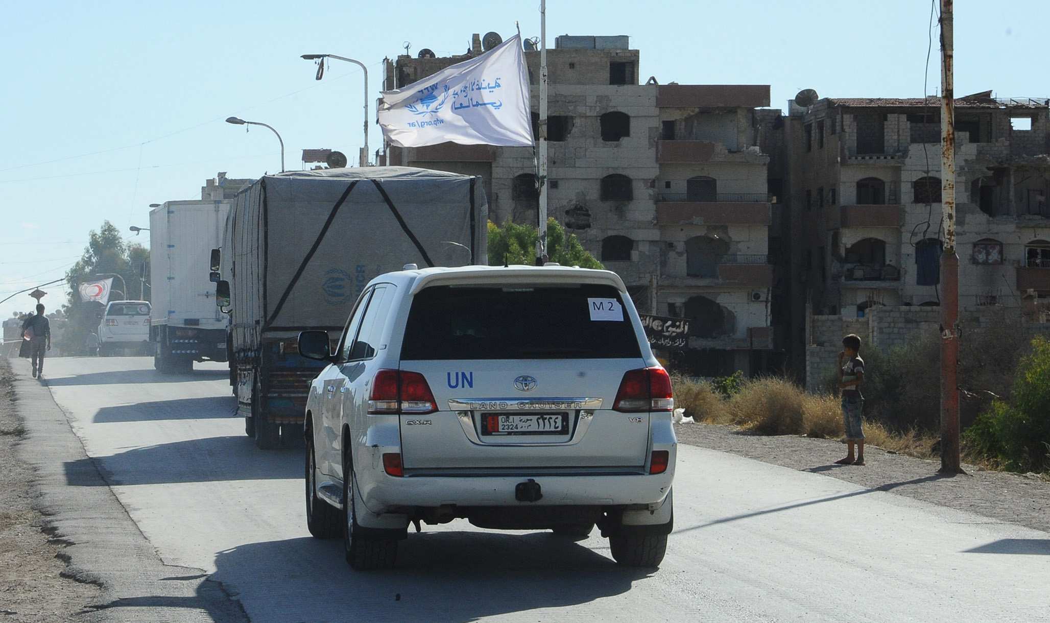 UN Aid Convoys In Syria Reach Besieged Towns Near Damascus For First ...