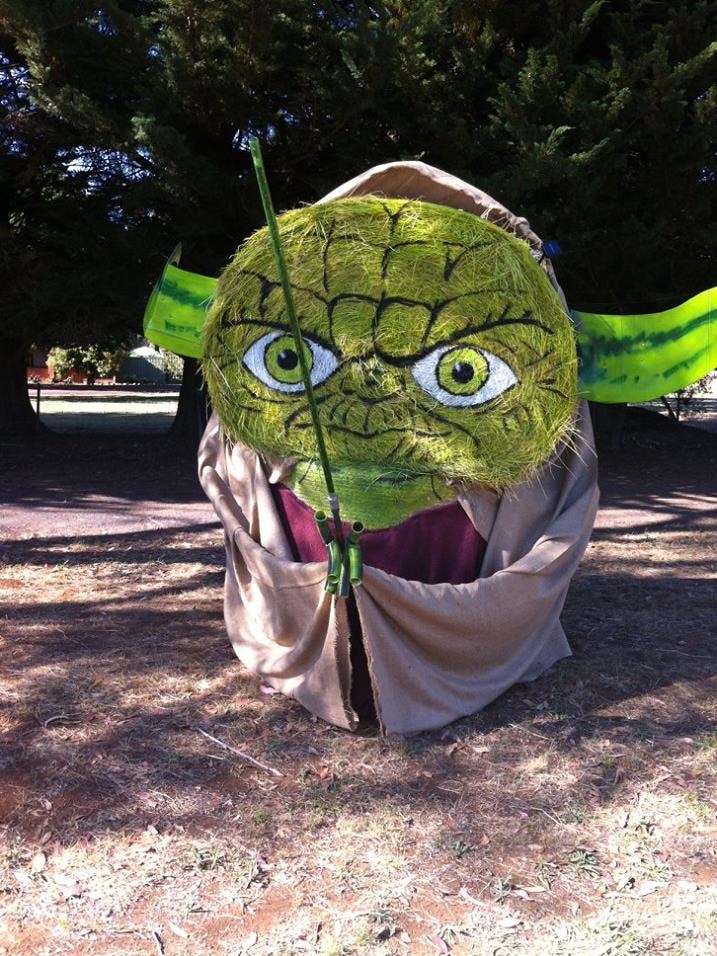A hay bale sculpture of Star Wars character, Yoda