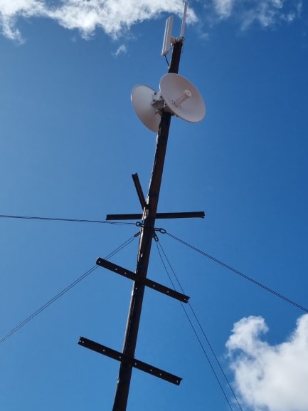 Transmitter dish with sky behind