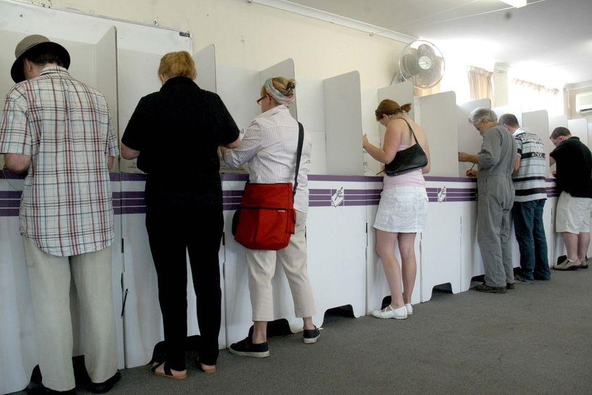 People lining up to cast their vote at a polling station
