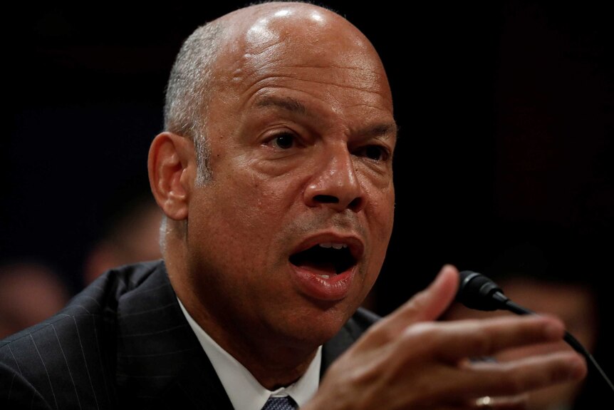 A close-up of Jeh Johnson testifying.