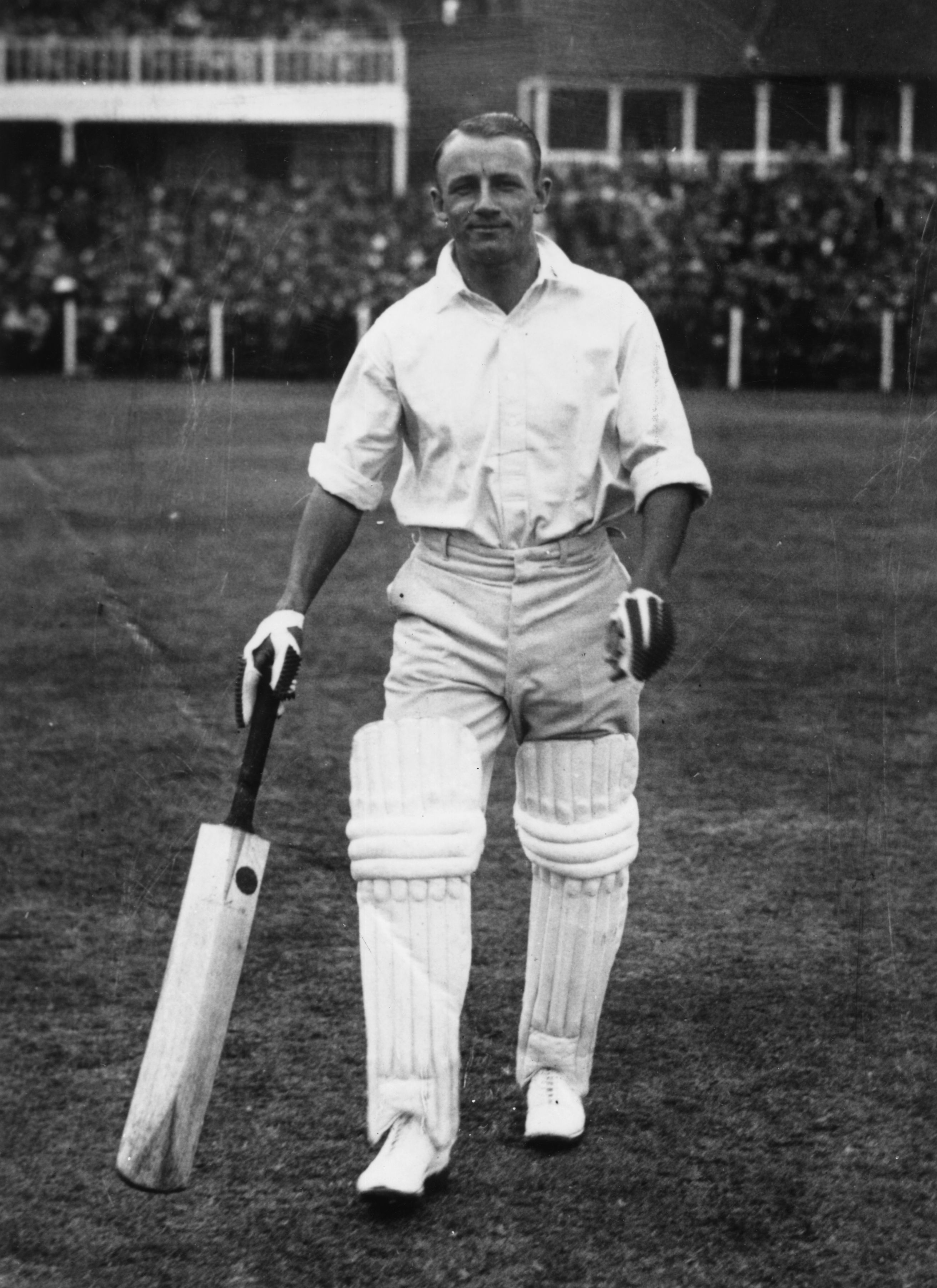 Don Bradman walks out to bat