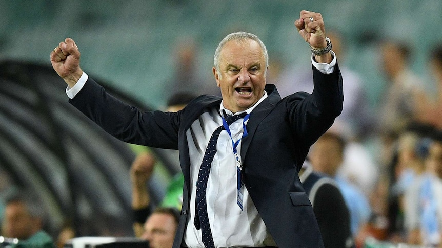 Graham Arnold celebrates Sydney FC's win over Adelaide