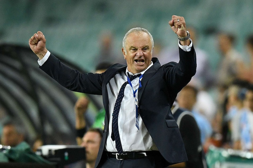 Graham Arnold celebrates Sydney FC's win over Adelaide