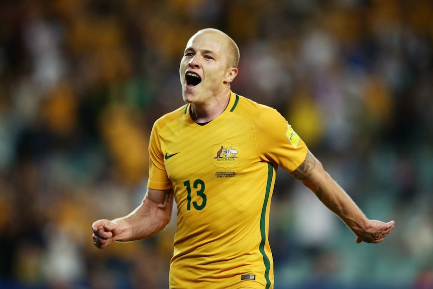 Aaron Mooy of the Socceroos celebrates scoring a goal