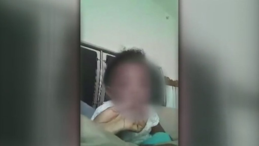 Mother posts video of baby smoking cigar to social media